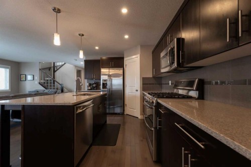 26 Riverglen Link West, Lethbridge, AB - Indoor Photo Showing Kitchen With Upgraded Kitchen