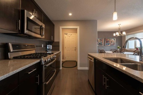26 Riverglen Link West, Lethbridge, AB - Indoor Photo Showing Kitchen With Double Sink