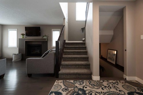 26 Riverglen Link West, Lethbridge, AB - Indoor With Fireplace