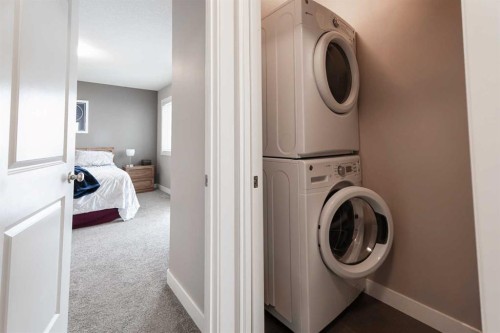 26 Riverglen Link West, Lethbridge, AB - Indoor Photo Showing Laundry Room