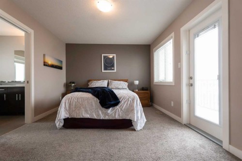 26 Riverglen Link West, Lethbridge, AB - Indoor Photo Showing Bedroom