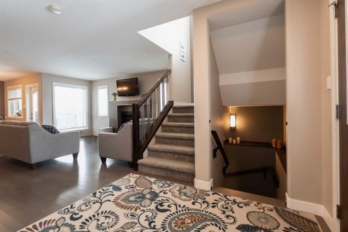 26 Riverglen Link West, Lethbridge, AB - Indoor With Fireplace