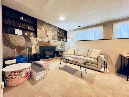 2802 77 Street, Coleman, AB - Indoor With Fireplace