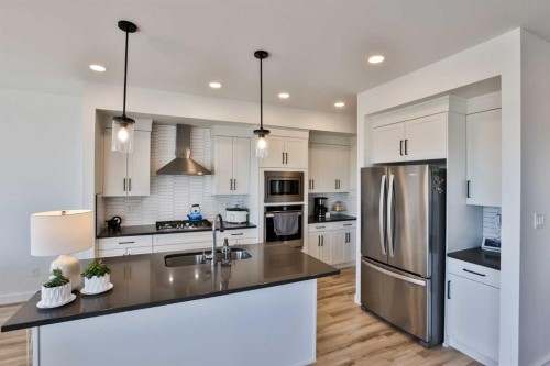 56 Greywolf Road North, Lethbridge, AB - Indoor Photo Showing Kitchen With Stainless Steel Kitchen With Upgraded Kitchen