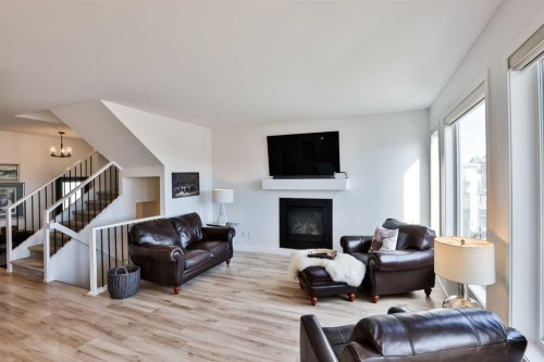 56 Greywolf Road North, Lethbridge, AB - Indoor Photo Showing Living Room With Fireplace