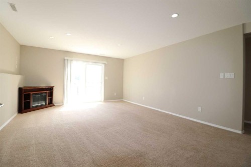 1664 Coalbanks Boulevard West, Lethbridge, AB - Indoor With Fireplace