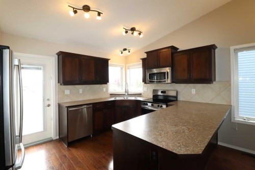 1664 Coalbanks Boulevard West, Lethbridge, AB - Indoor Photo Showing Kitchen With Double Sink