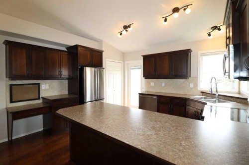 1664 Coalbanks Boulevard West, Lethbridge, AB - Indoor Photo Showing Kitchen With Double Sink