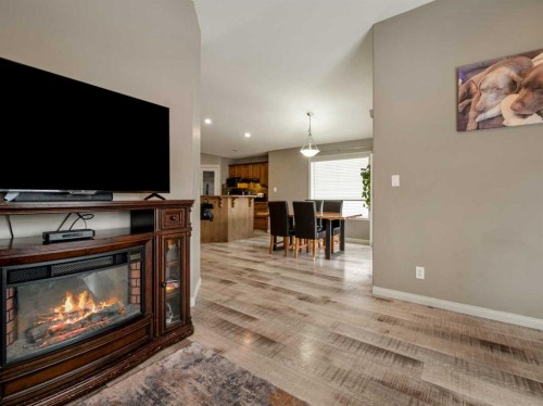 214 Firelight Crescent West, Lethbridge, AB - Indoor Photo Showing Living Room With Fireplace