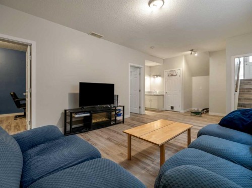 214 Firelight Crescent West, Lethbridge, AB - Indoor Photo Showing Living Room