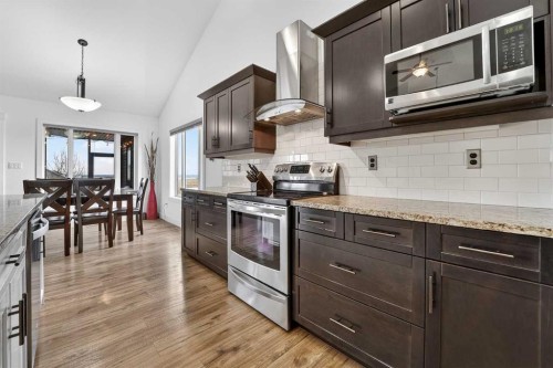 64 Riverhurst Cove West, Lethbridge, AB - Indoor Photo Showing Kitchen With Upgraded Kitchen