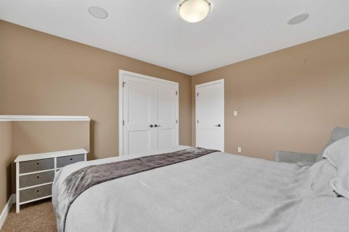 64 Riverhurst Cove West, Lethbridge, AB - Indoor Photo Showing Bedroom