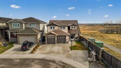 64 Riverhurst Cove West, Lethbridge, AB - Outdoor With Facade