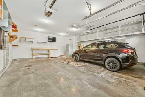 64 Riverhurst Cove West, Lethbridge, AB - Indoor Photo Showing Garage