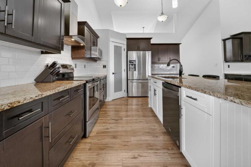 64 Riverhurst Cove West, Lethbridge, AB - Indoor Photo Showing Kitchen With Upgraded Kitchen