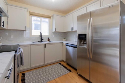 28 Dakota Road West, Lethbridge, AB - Indoor Photo Showing Kitchen With Stainless Steel Kitchen With Double Sink