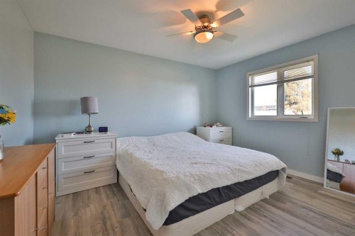 235 E 200 S, Raymond, AB - Indoor Photo Showing Bedroom