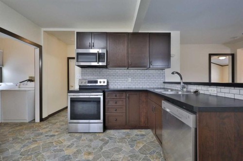 1817 1A Avenue North, Lethbridge, AB - Indoor Photo Showing Kitchen With Double Sink