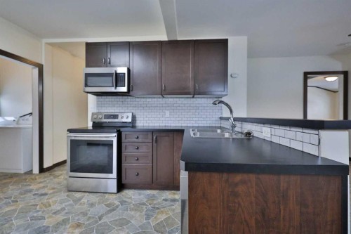 1817 1A Avenue North, Lethbridge, AB - Indoor Photo Showing Kitchen With Double Sink