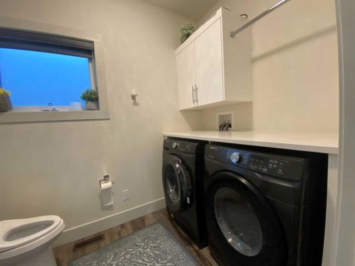 5402 43 Street, Taber, AB - Indoor Photo Showing Laundry Room