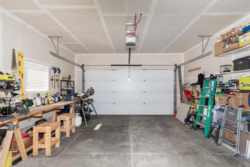 22 Rivergrove Run West, Lethbridge, AB - Indoor Photo Showing Garage