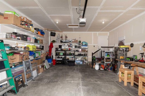 22 Rivergrove Run West, Lethbridge, AB - Indoor Photo Showing Garage