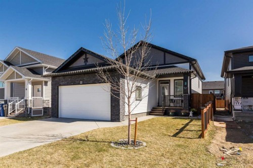 22 Rivergrove Run West, Lethbridge, AB - Outdoor With Facade