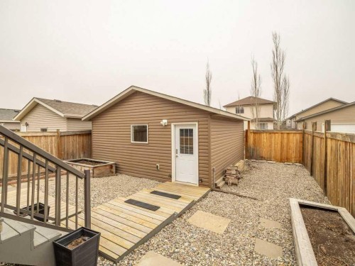 406 Twinriver Road West, Lethbridge, AB - Outdoor With Deck Patio Veranda With Exterior