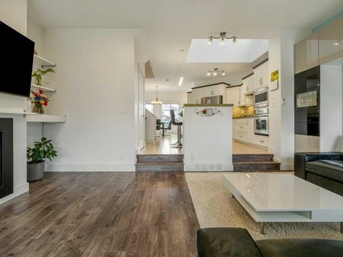 406 Twinriver Road West, Lethbridge, AB - Indoor With Fireplace