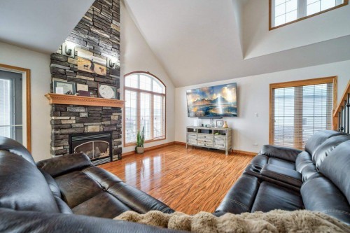 2222 Twp Rd 7-5, Lundbreck, AB - Indoor Photo Showing Living Room With Fireplace