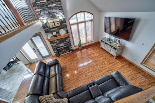 2222 Twp Rd 7-5, Lundbreck, AB - Indoor Photo Showing Living Room With Fireplace