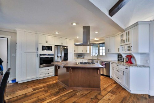 609 7 Avenue, Stirling, AB - Indoor Photo Showing Kitchen With Stainless Steel Kitchen With Double Sink
