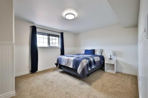 609 7 Avenue, Stirling, AB - Indoor Photo Showing Bedroom