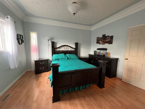2134 21 Avenue, Coaldale, AB - Indoor Photo Showing Bedroom