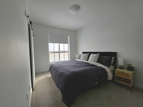 633 Blackwolf Boulevard North, Lethbridge, AB - Indoor Photo Showing Bedroom