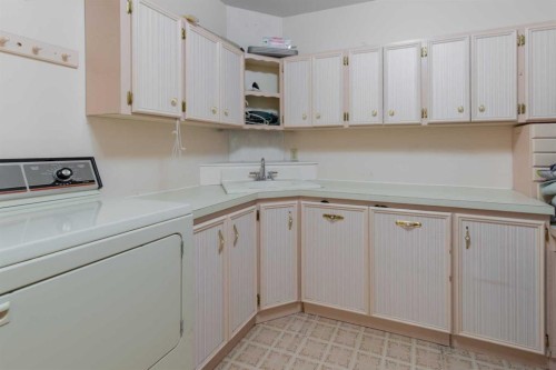 63004A Hwy 5, Welling, AB - Indoor Photo Showing Laundry Room