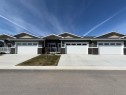 #502-1940 Parkside Way, Coaldale, AB  - Outdoor With Facade 