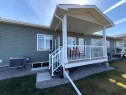 #502-1940 Parkside Way, Coaldale, AB  - Outdoor With Exterior 