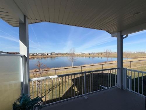 #502-1940 Parkside Way, Coaldale, AB - Outdoor With Body Of Water With View With Exterior