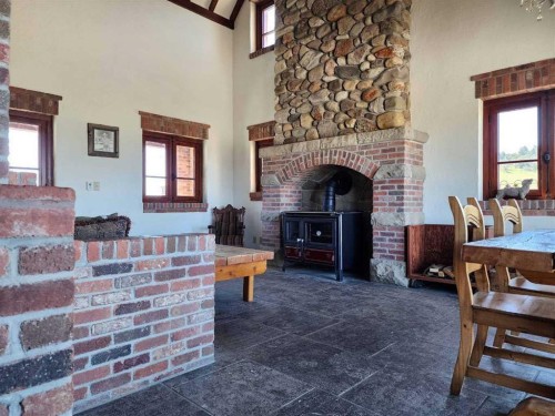 1029 Twp Rd  8-4, Cowley, AB - Indoor With Fireplace
