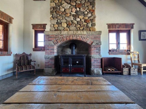 1029 Twp Rd  8-4, Cowley, AB - Indoor With Fireplace