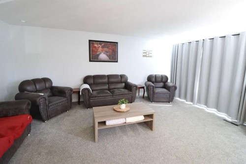 2214 19 St, Coaldale, AB - Indoor Photo Showing Living Room
