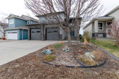 157 Tartan Circle West, Lethbridge, AB - Outdoor With Facade