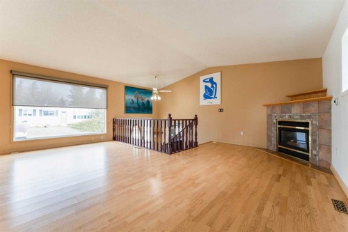 437 Main Street, Milk River, AB - Indoor Photo Showing Living Room With Fireplace