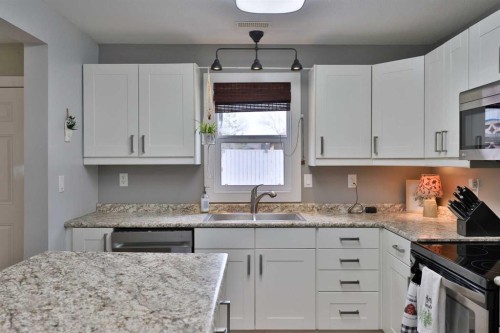 28 E 100 S, Raymond, AB - Indoor Photo Showing Kitchen With Double Sink With Upgraded Kitchen