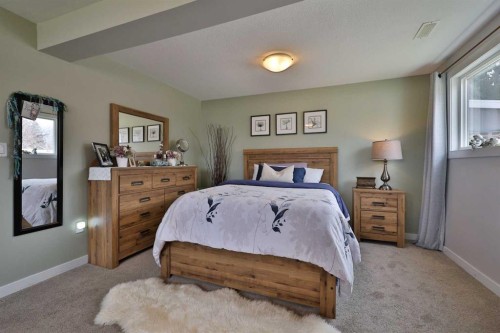 28 E 100 S, Raymond, AB - Indoor Photo Showing Bedroom