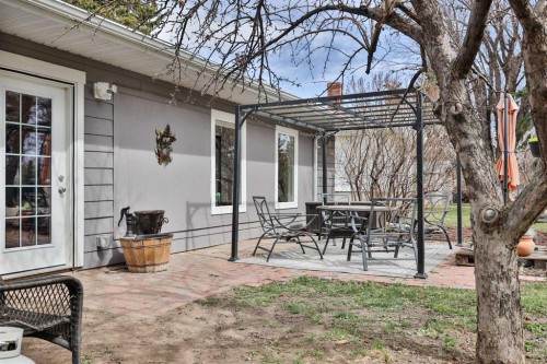 28 E 100 S, Raymond, AB - Outdoor With Deck Patio Veranda