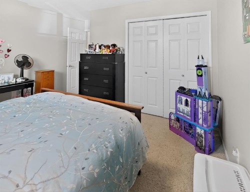 711 Sunset Place, Coaldale, AB - Indoor Photo Showing Bedroom