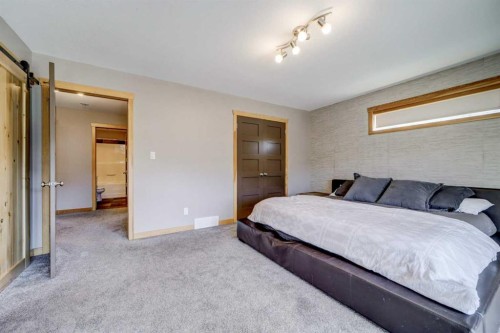 75 Ironstone Drive, Coleman, AB - Indoor Photo Showing Bedroom