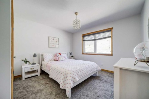 75 Ironstone Drive, Coleman, AB - Indoor Photo Showing Bedroom